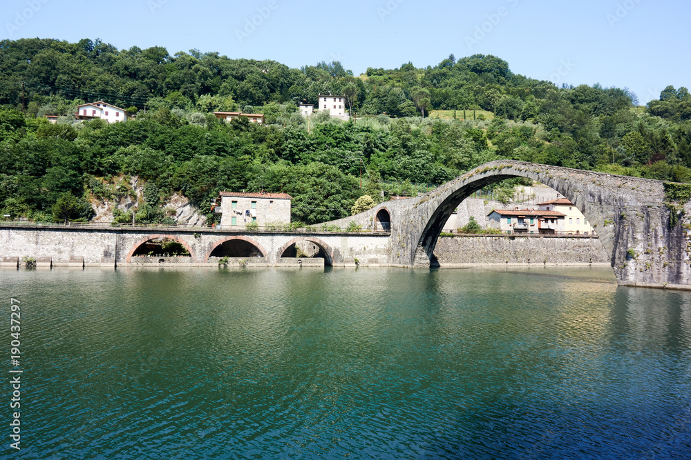 Old bridge on the mountain river, ITALY / Ponte a Moriano