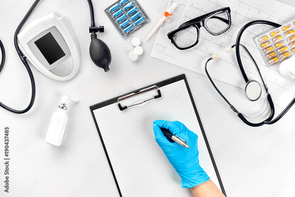 Doctor s table, tools, medical instruments, therapist tonometer, blood pressure, work in hospital on white background flat lay Doctor s table, tools, medical instruments, therapist tonometer, blood pressure, work in hospital on white background flat lay