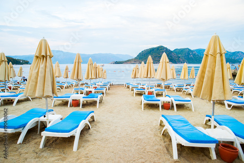 Sun loungers on a beach in Turkey © dima