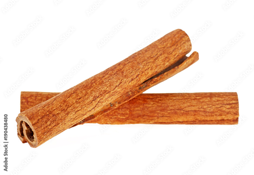 Two cinnamon sticks isolated on white background Two cinnamon sticks isolated on white background