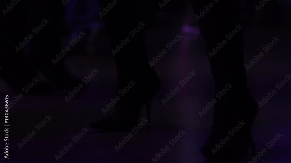 legs of a girl dancing in the club. Slow-motion legs of a girl dancing in the club. Slow-motion