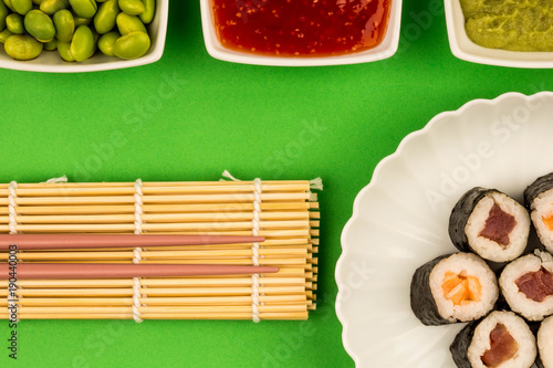 Japanese Style Maki Salmon and Tuna Sushi Rolls photo