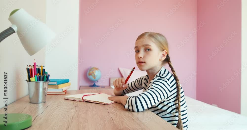 Girl doing homework Girl doing homework