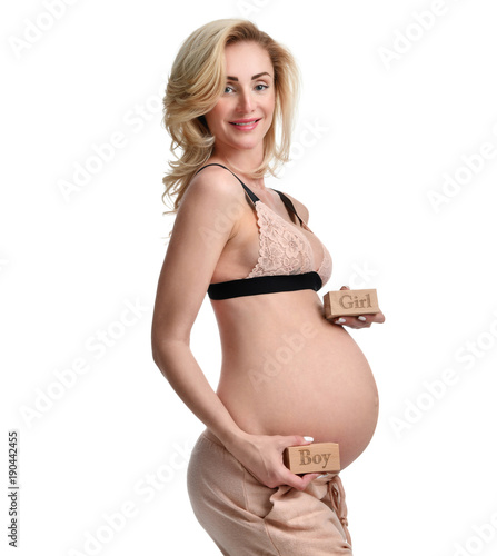 Belly of pregnant women with sign expectation girl or boy 