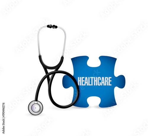 Medical stethoscope,piece of puzzle with HEALTH CARE photo