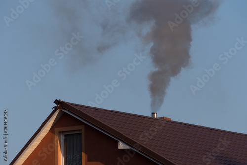 black smoke from the chimney