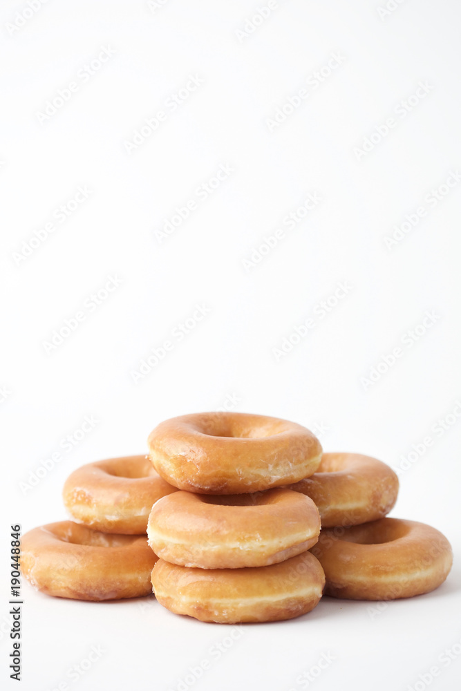 Stacked Delicious Breakfast Donuts with Room for Copy Stacked Delicious Breakfast Donuts with Room for Copy
