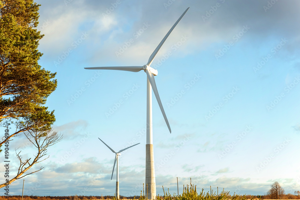 Windmills for electric power production. Ecology concept Windmills for electric power production. Ecology concept