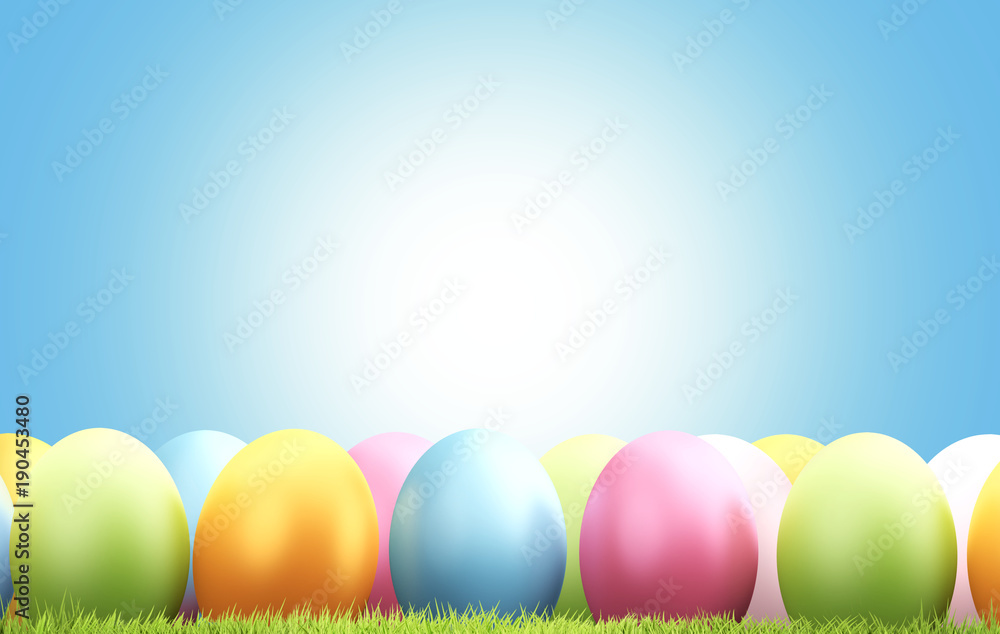 colorful festive Easter eggs hidden in green grass meadow blades of grass