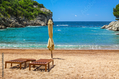 Foto Empty beach with two chairs, Queen's Beach, Montenegro