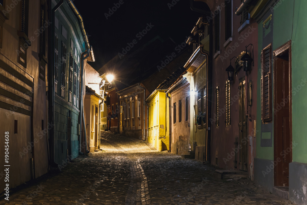 Night view of historic town Sighisoara. City in which was born Vlad Tepes, Dracula