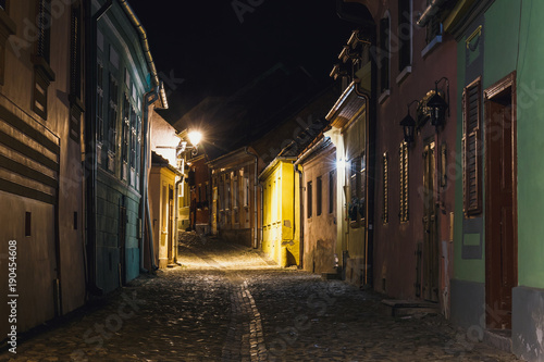 Night view of historic town Sighisoara. City in which was born Vlad Tepes, Dracula © dziewul