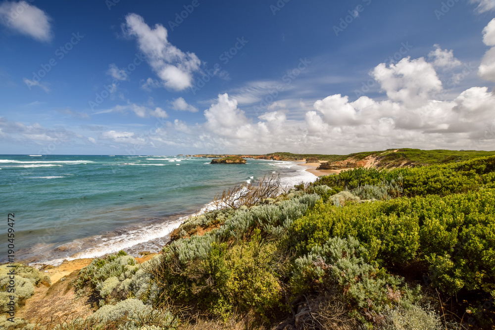 Beautiful wide angle view of the coastline at Bay Of Martyrs along the Great Ocean Road near the Twelve Apostles in Victoria, Australia. The Bay Of Islands is a popular tourist destination.