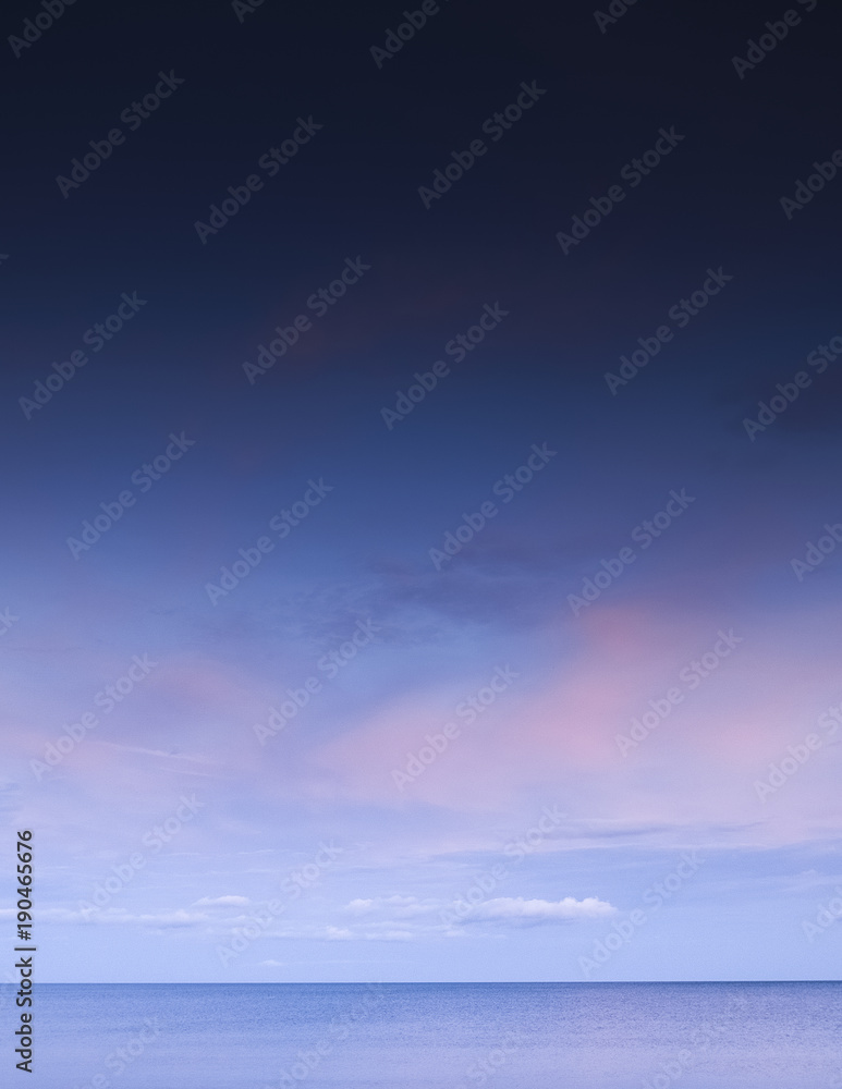 Beautiful morning sky with blue and pink tone, scattered clouds, Seascape