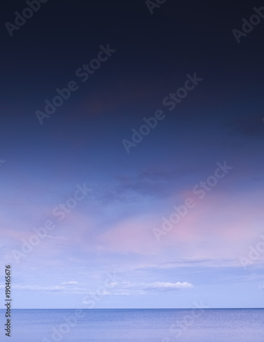 Beautiful morning sky with blue and pink tone, scattered clouds, Seascape