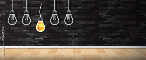 Light bulb concept idea on wall.