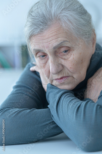 beautiful sad elderly woman close-up