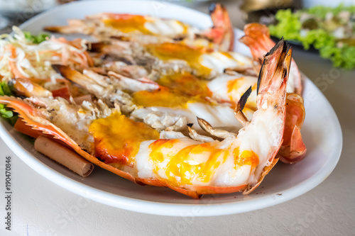 Roasted big river shrimp on the white plate , Selective focus.