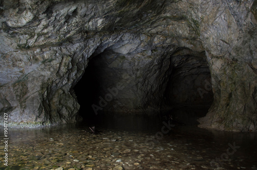 Underground view - a cave inside with an underground river