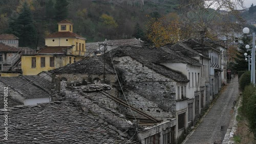 Albania, Gjirokaster. View from above to the street and roofs. Pan 