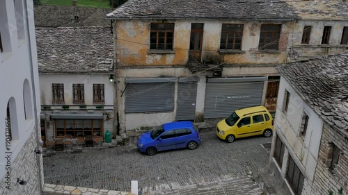 Albania, Gjirokaster. View from above to the street and roofs. Pan 