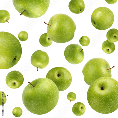 Fruit background with green apples on white. Flying (falling) fruit.