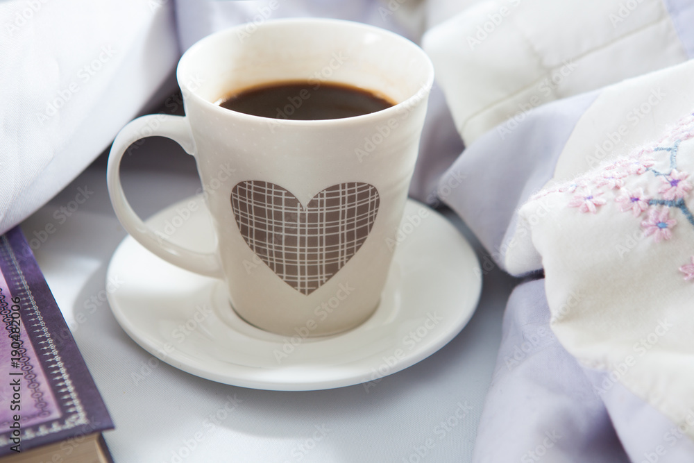 Bedroom on the bed, morning coffee. Valentine's Day. Happiness. A heart. Bedroom on the bed, morning coffee. Valentine's Day. Happiness. A heart.