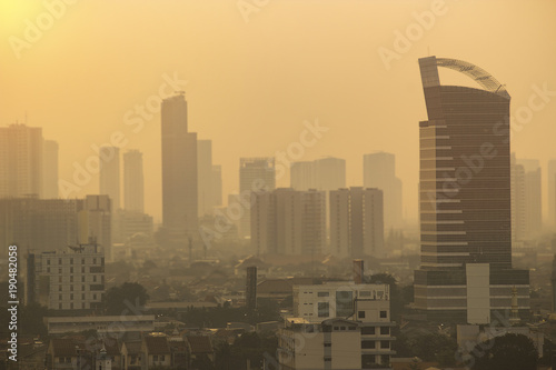 Jakarta city skyline. Indonesian travel and sightsee in urban central city with highrise buildings and bright light.