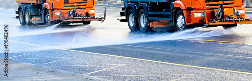 Cleaning machines washes the city street