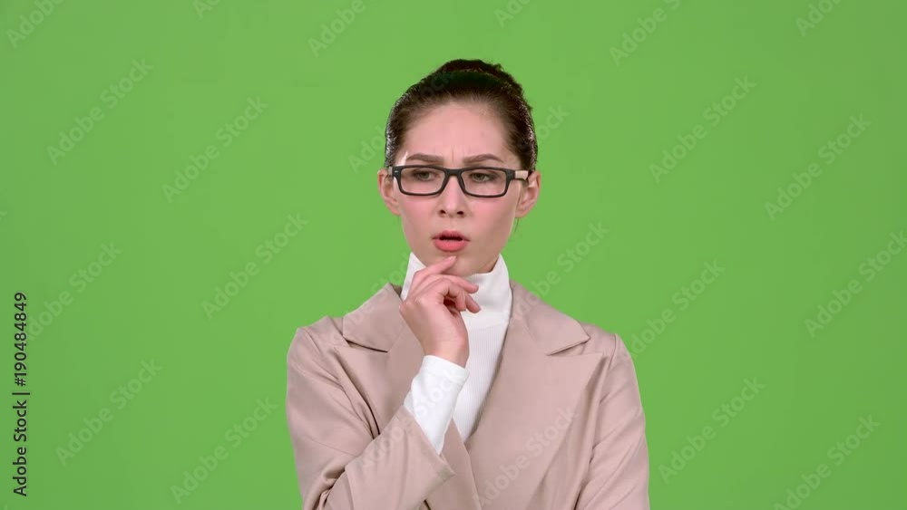Chief woman thinks about serious issues and finds a solution. Green screen Chief woman thinks about serious issues and finds a solution. Green screen