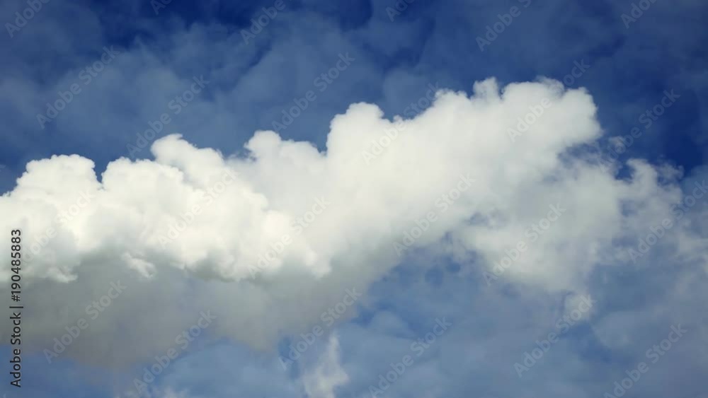 Thick white smoke swirled and poured from the chimney. Large industrial pipe (red and white) and white smoke. White thick smoke against a clear blue sky. A smoking pipe. Thick white smoke swirled and poured from the chimney. Large industrial pipe (red and white) and white smoke. White thick smoke against a clear blue sky. A smoking pipe.