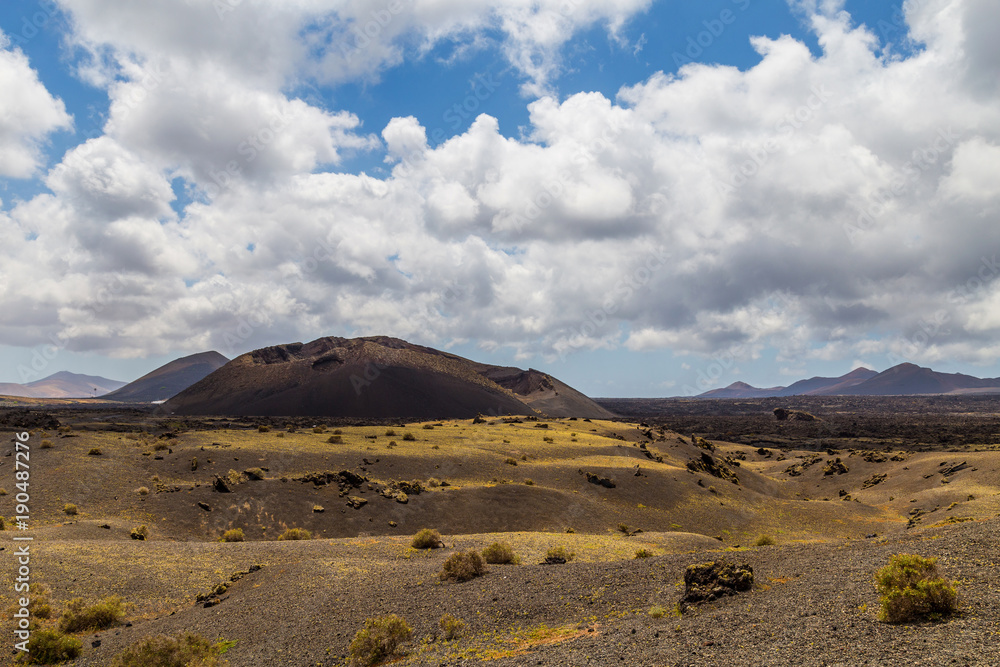 Volcano valley in the Timanfaya National Park. Volcano called Caldera de los Cuervos. Lanzarote, Canary Islands, Spain