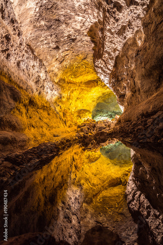 Cueva de los Verdes is a lava tube and tourist attraction in Haria, Lanzarote, Canary Islands, Spain. The cave lies within the Monumento Natural del Malpais de La Corona