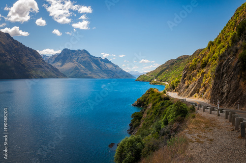 Scenic winding road along the shore at Lake Wakatipu  New Zealand  South Island