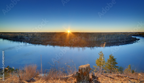 Evening landscape with a river  at sunset. Photographed in the central part of Russia.