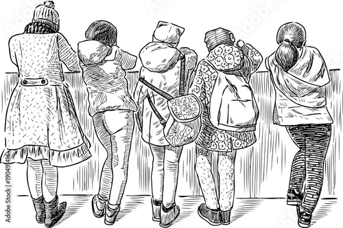 Little schoolgirls stopped on the embankment