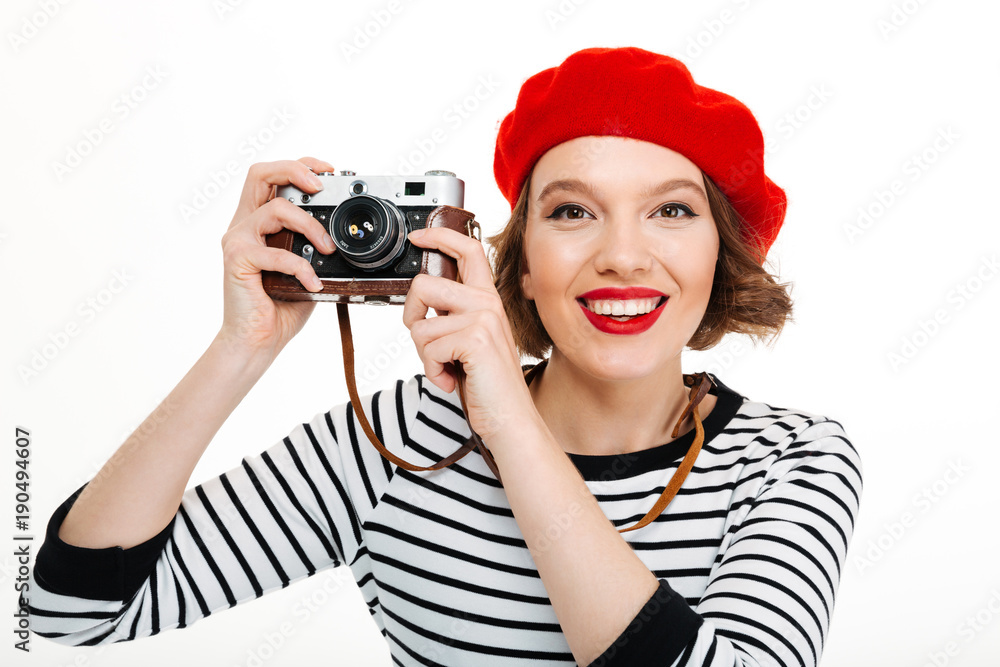 Photographer woman isolated over white background