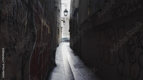 Paris,France-January 22, 2018: View of Rue du Chat qui Peche, the narrowest street in Paris, 26 meters long by 1.8 meters wide, from Rue de la Huchette. . 

