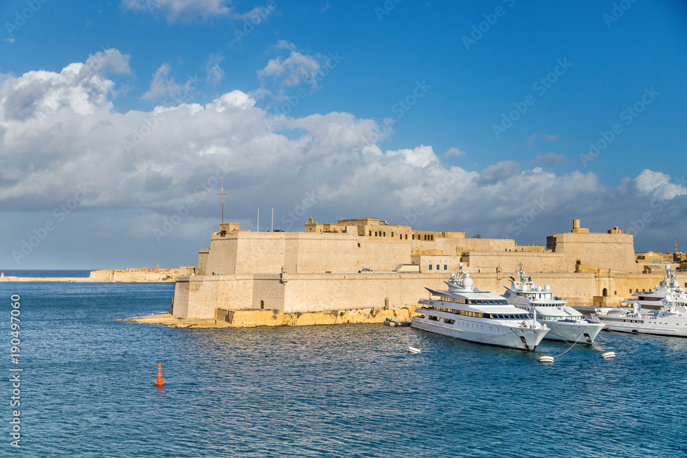 Fort Saint Angelo is a large bastioned fort in Birgu, Malta, located in the centre of the Grand Harbour as seen from Valletta.