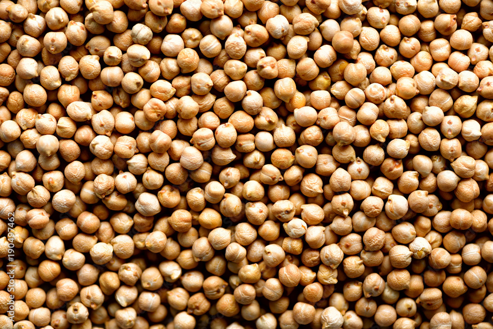 Raw organic dried chickpea texture background. Vegan healthy nutrition. Top view, copy space, healthy lifestyle concept. Raw organic dried chickpea texture background. Vegan healthy nutrition. Top view, copy space, healthy lifestyle concept.