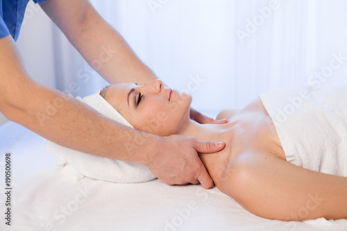 doctor cosmetologist doing facial massage girl spa treatments