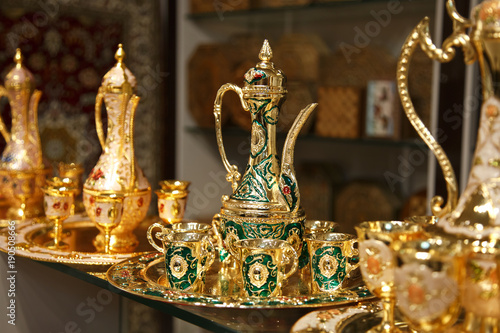 Traditional Arabic coffee sets with traditional coffee pot in the Arab market in Jerusalem