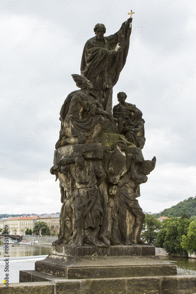 Ancient sculptures at Charles Bridge in Prague. Czech Republic