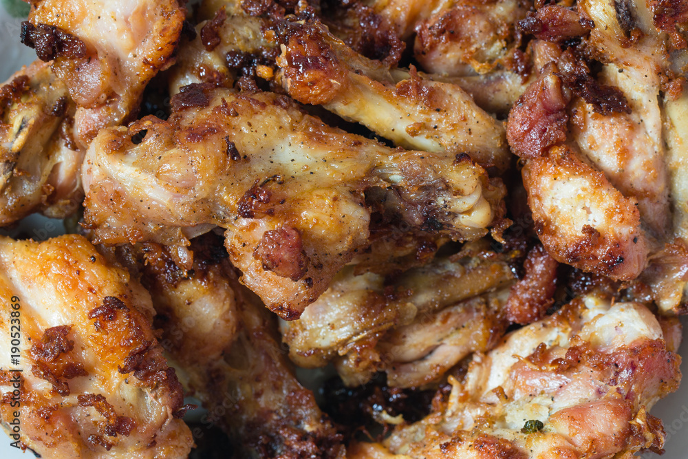 Grilled chicken roast close up.