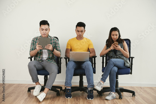 Young people with devices