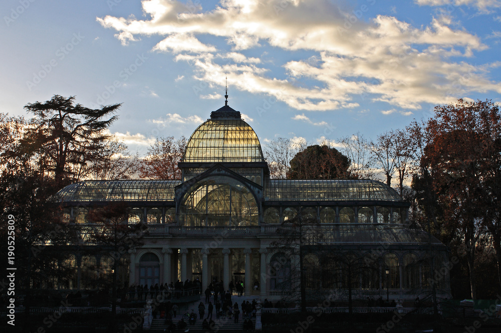 Fototapeta premium Crystal Palace and blue sky with clouds, Madrid, Spain