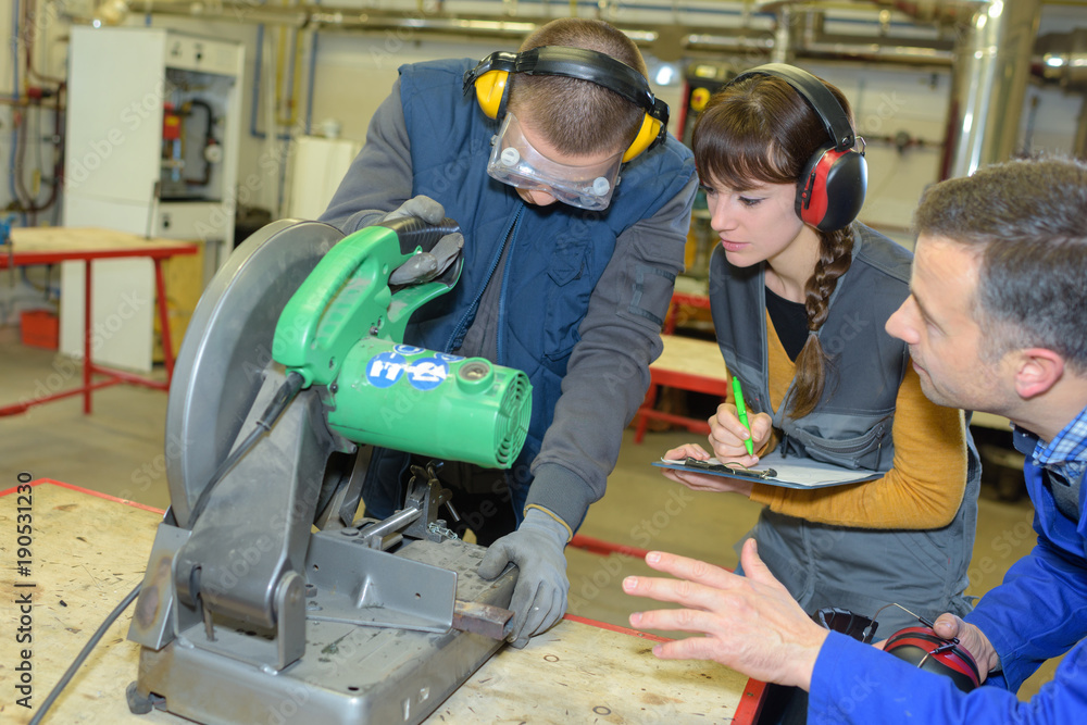 student in ironworks class using circular saw student in ironworks class using circular saw