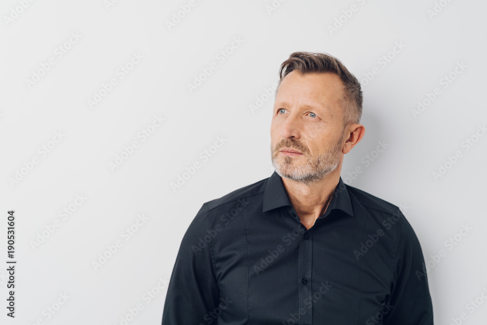 Middle-aged creative man daydreaming about future Middle-aged creative man daydreaming about future