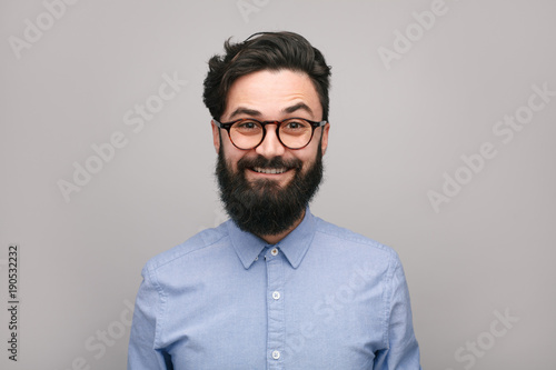 Smiling bearded man in shirt and eyeglasses © kegfire