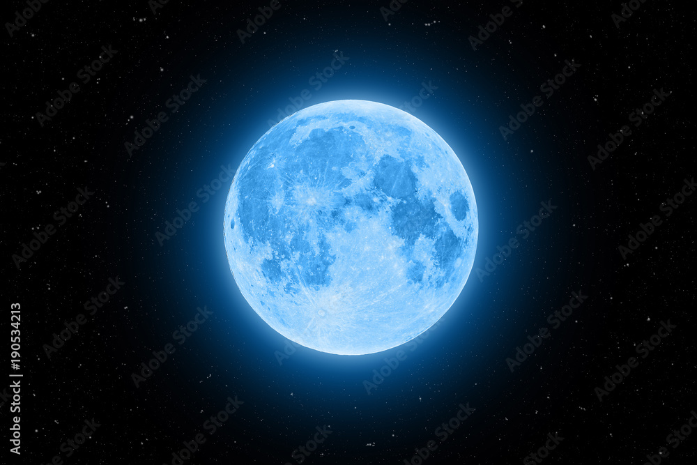Blue super moon glowing with blue halo surrounded by stars on black sky background